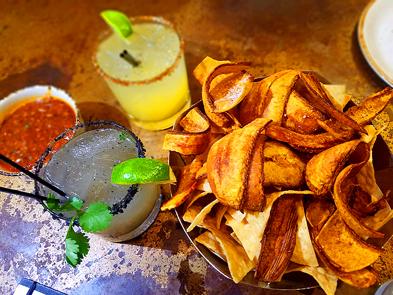 Plantain chips salsa and drinks